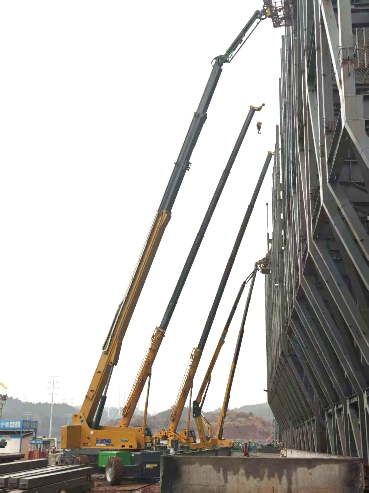 高空協(xié)同顯實(shí)力｜徐工裝備助陣銀聯(lián)黃山園區(qū)，外立面施工提質(zhì)增效